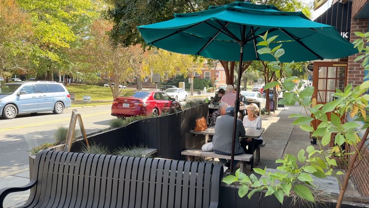 People enjoyed a meal outside in downtown Hillsborough shortly after the "boom" was reported. (Spectrum News 1/Kyleigh Panetta)